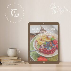 Portada de un ebook de alimentación ayurvédica sobre una mesa
